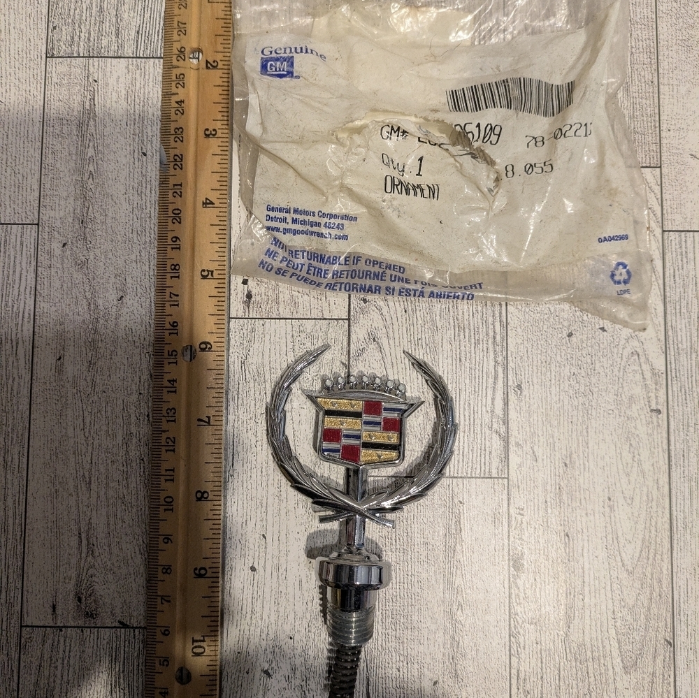 Cadillac Silver and Red Hood Ornament